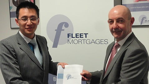 Ying Tan hands over the first application form to Ross Turrell